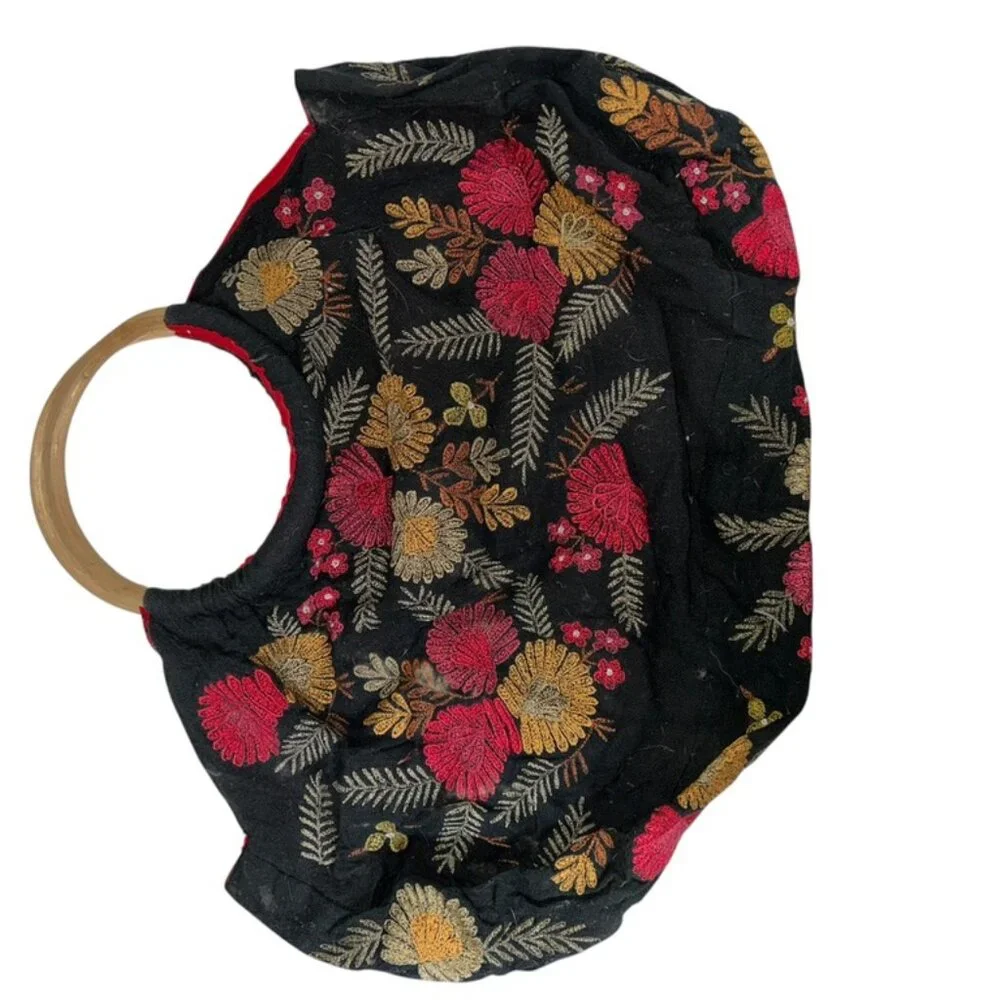Christian Livingston black embroidered floral bag